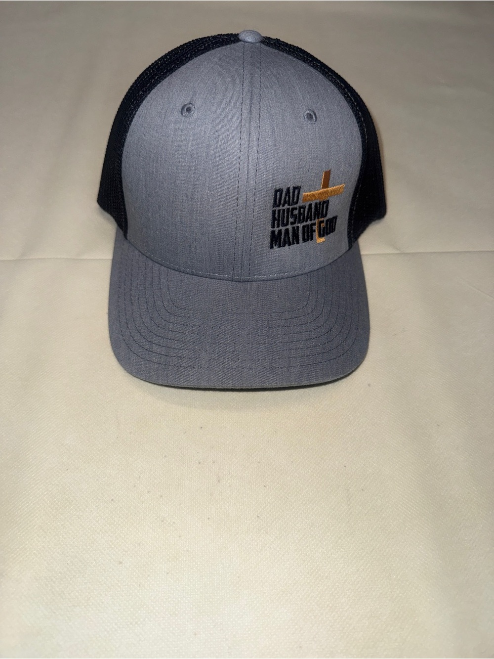 Gray & Black Trucker Hat with Gold Cross Embroidery